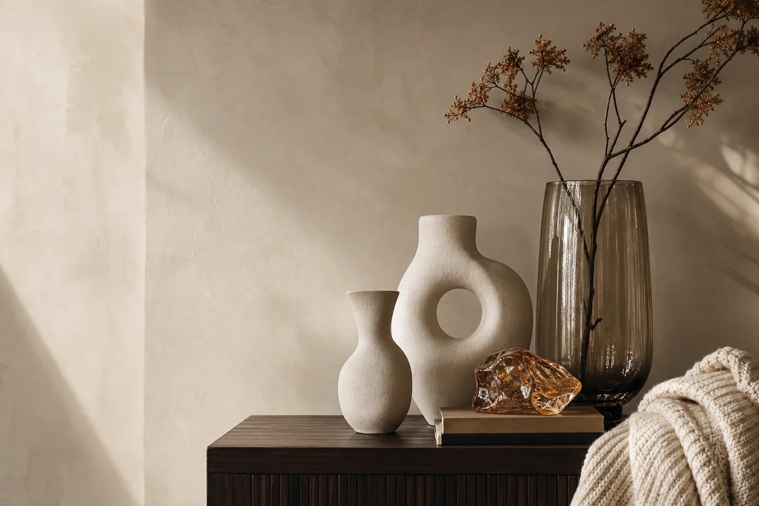 Premium interior styled with sculptural decor and ceramic vessels